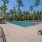 a pool surrounded by trees