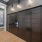 a mail room with large black mailboxes