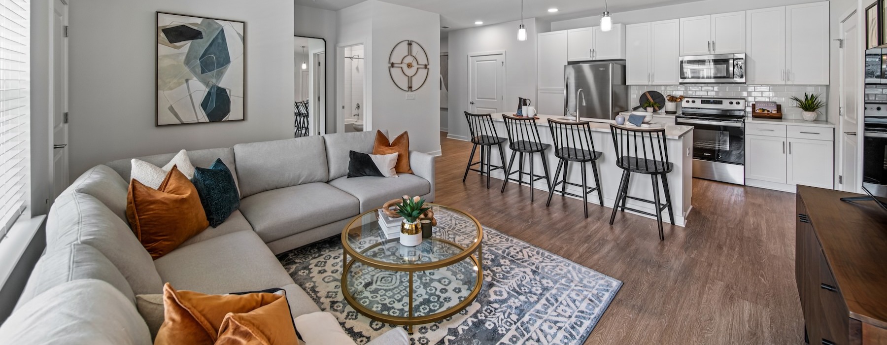 a living room with a couch and a table