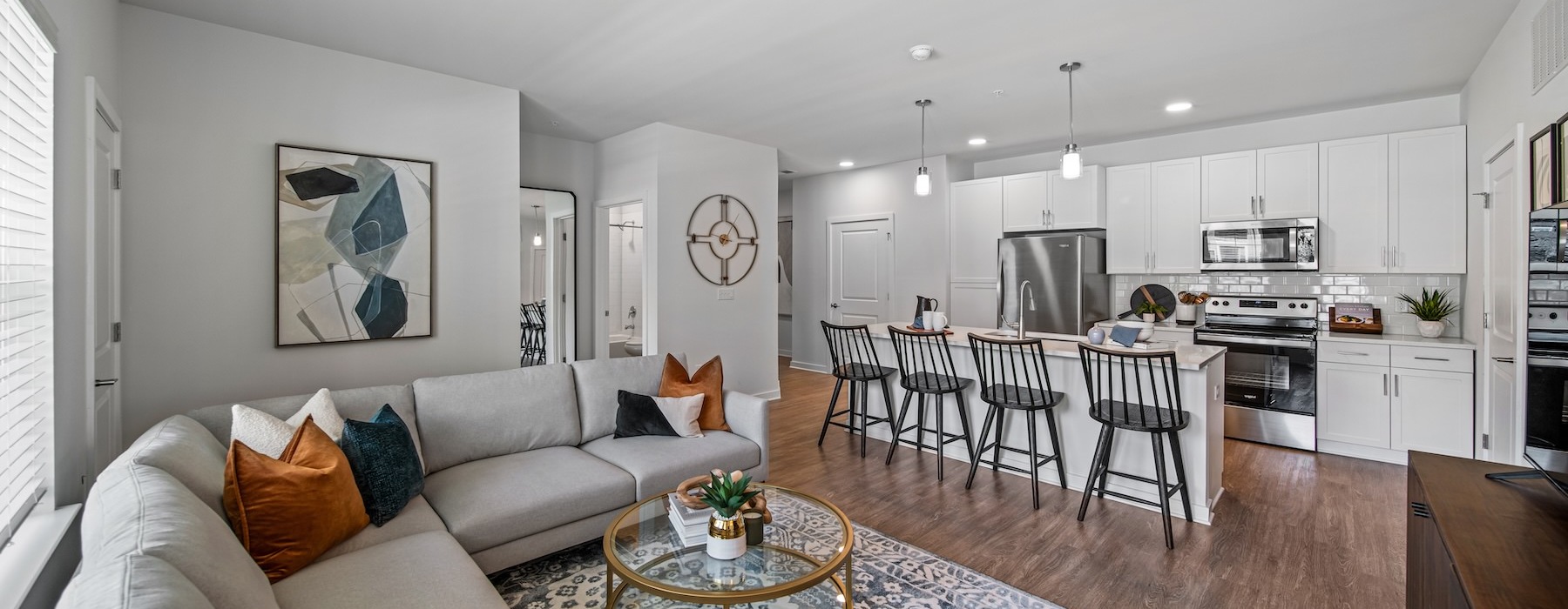 a living room with a couch and a table