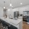 a kitchen with white cabinets