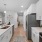 a kitchen with white cabinets