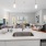 a kitchen with a sink and a mirror