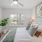 a bedroom with a bed and a desk